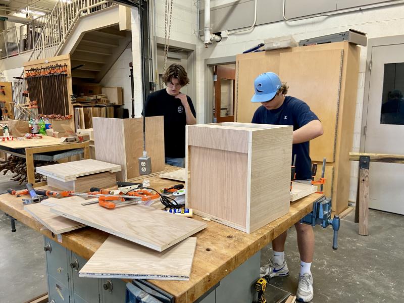 Cape High sophomore Keller Mancari, left, and junior Luke McCarthy competed in the Delaware SkillsUSA cabinetmaking competition at Cape High March 24. ELLEN DRISCOLL PHOTOS